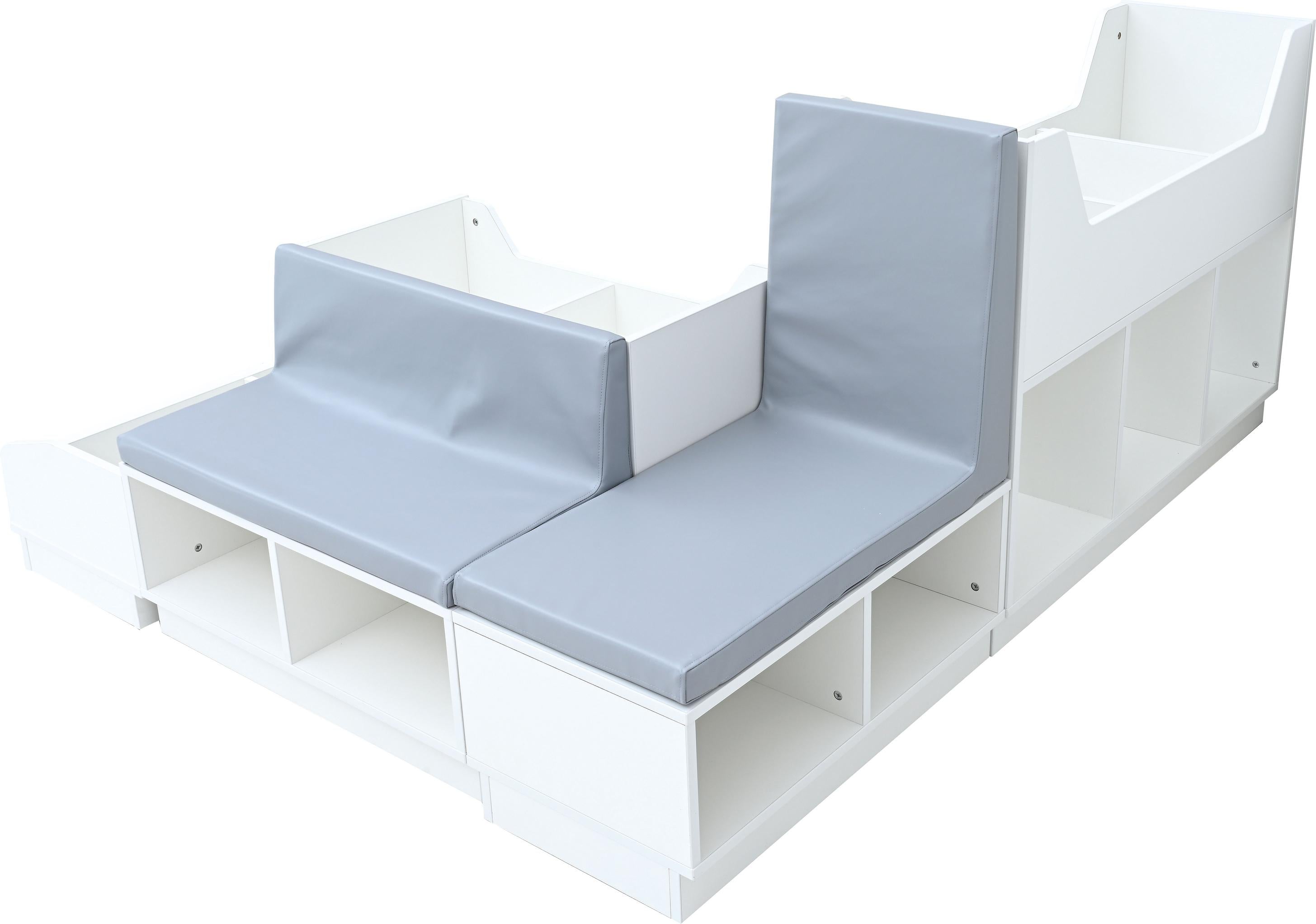 Quadro-Leseecke mit grauer Bücherbank für Kindergruppen. - Produkt wird im Kindergarten oder Schule genutzt.